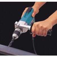 Безударная дрель Makita DP4003